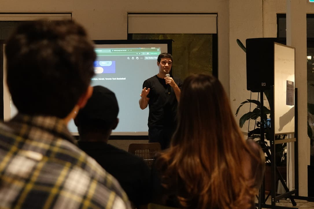 A member demoing a project to the room